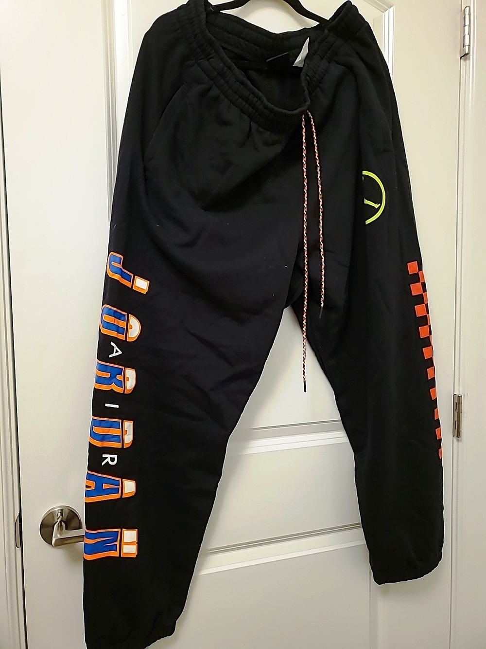 Jordan Black Joggers with Orange and Blue Side Graphics